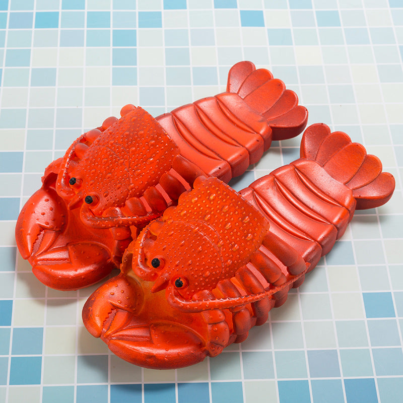  red lobster-shaped son a blue and white tiled surfaceippers