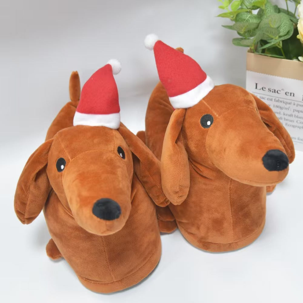 Novelty Pair of brown dog-shaped slippers with Santa hats on a white background
