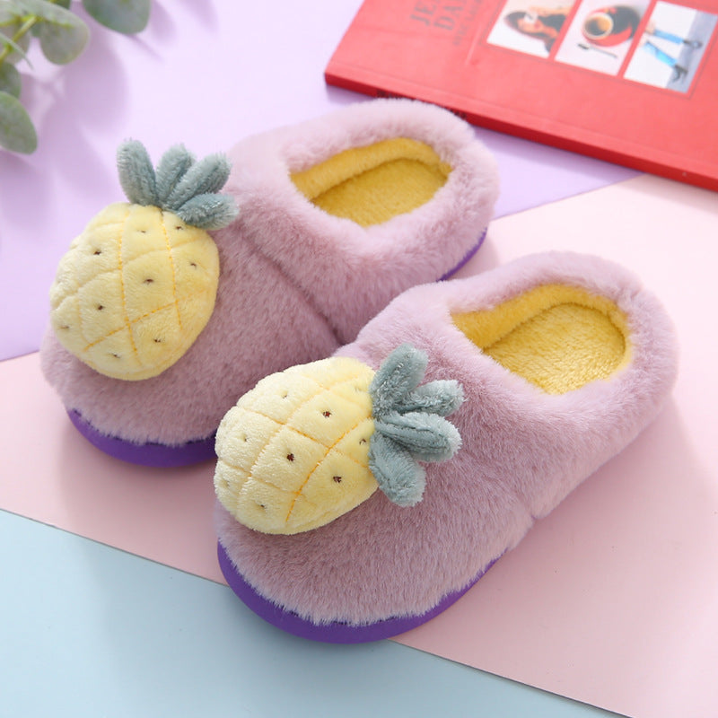 Purple slippers with pineapple decorations on a colorful background