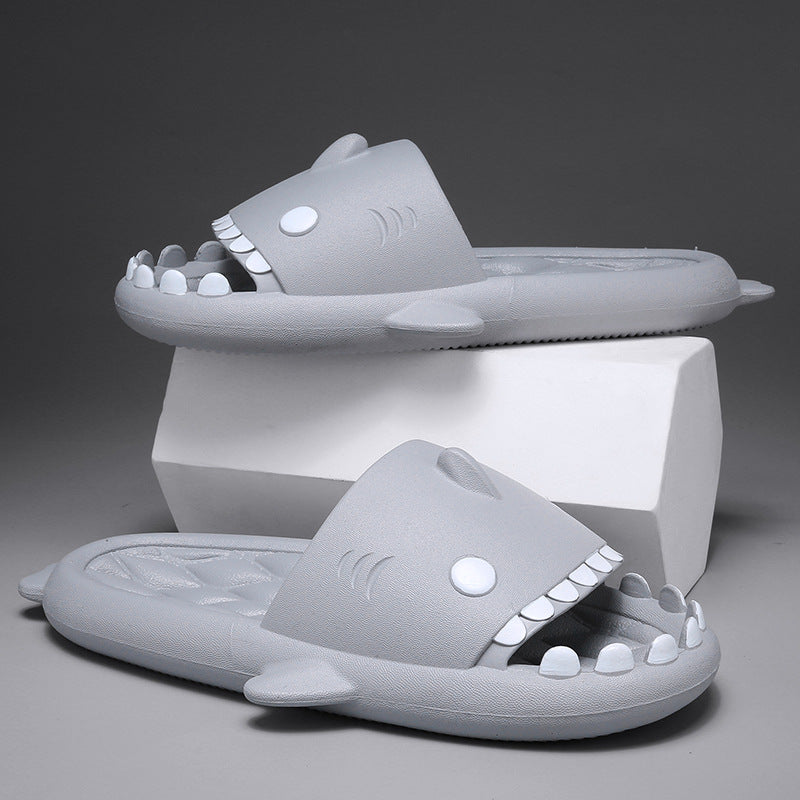Gray shark-themed slides with a stand on a gray background