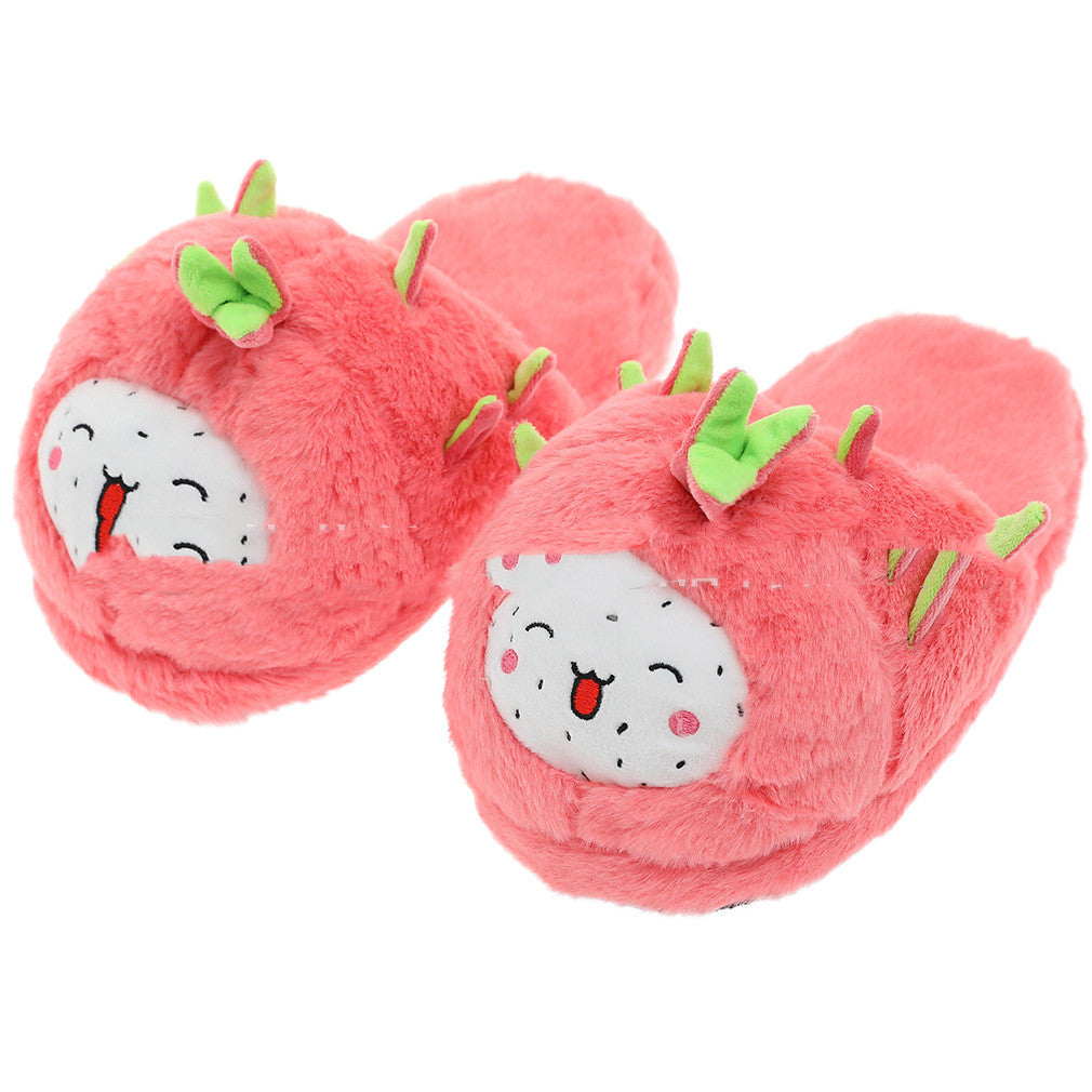 Avocado-themed slippers with faces on a white background