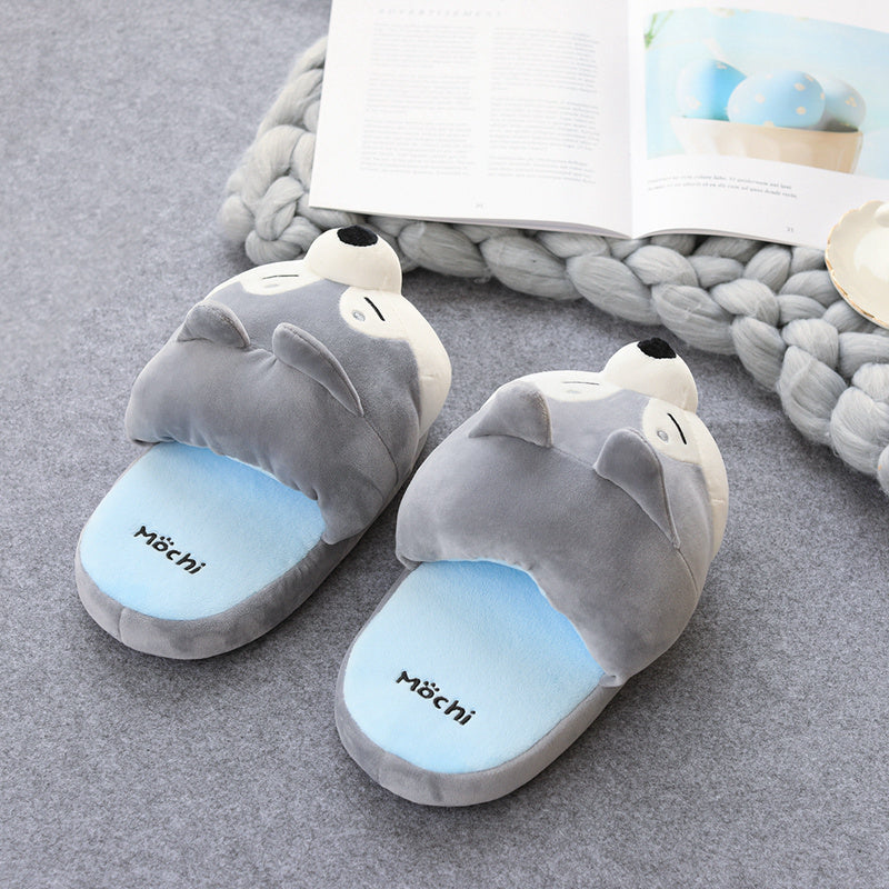 Gray Novelty slippers with a cartoon design on a gray surface, featuring the brand 'Mochi'.