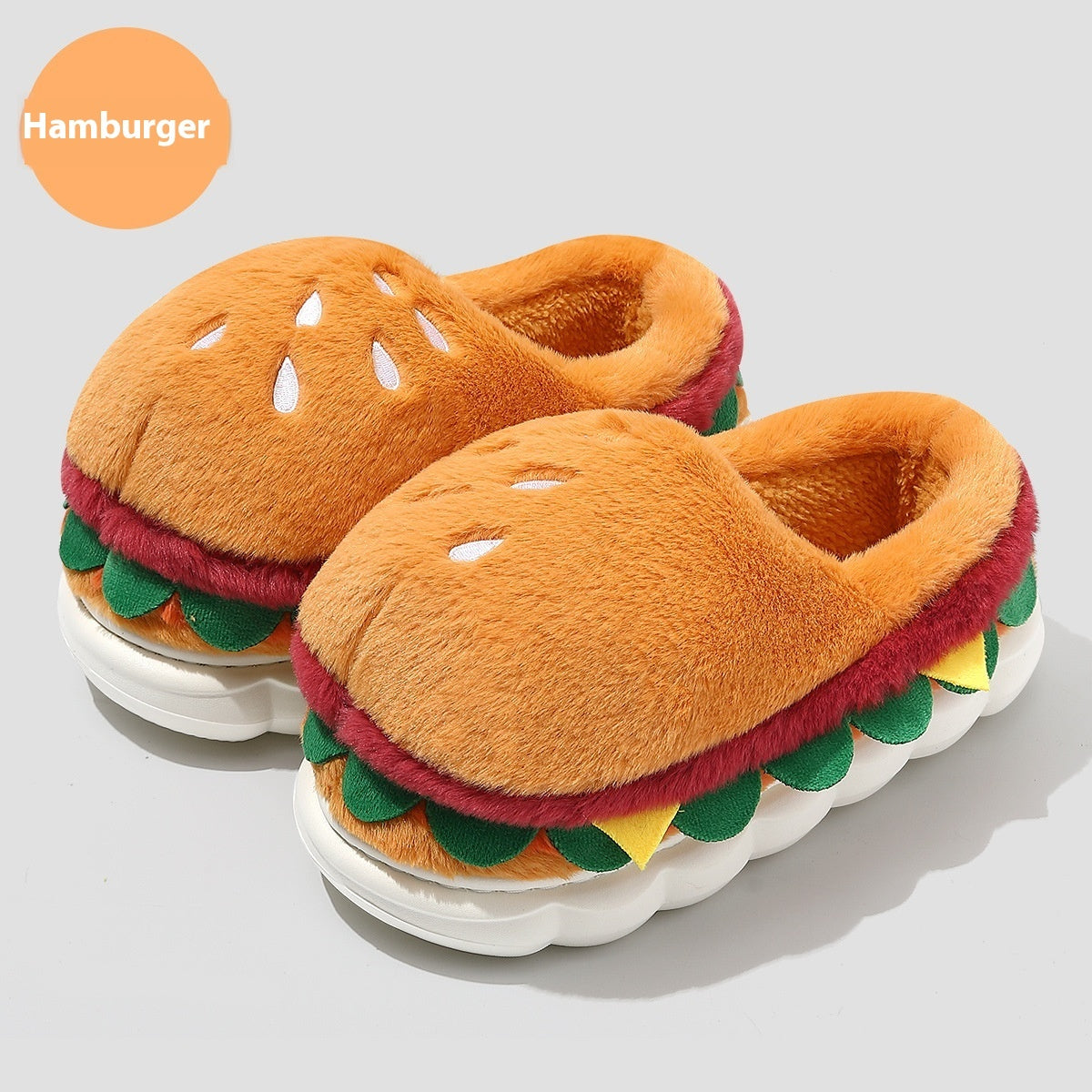Hamburger-themed slippers on a light gray background