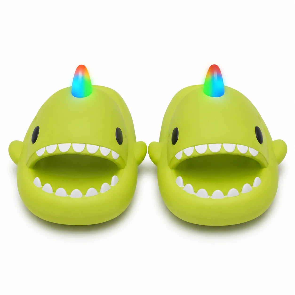 Green shark-shaped slippers with LED lights on a white background