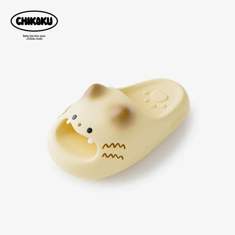 Yellow slide sandal with a cartoonish design on a white background, featuring the Chikoku brand.