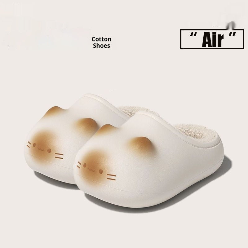 Pair of white slippers with brown accents on a light gray background