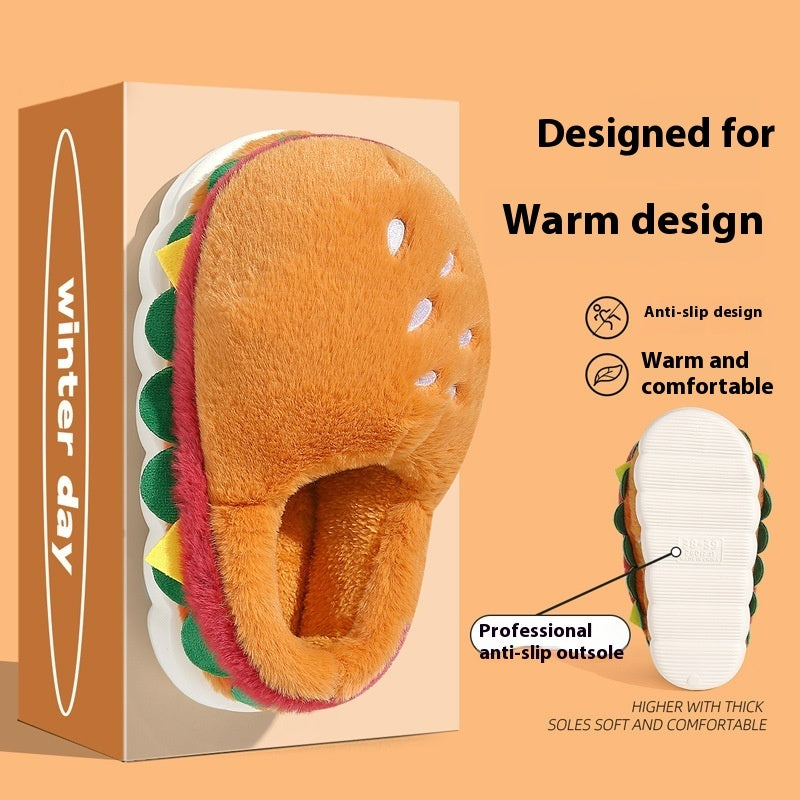 Hamburger-shaped slippers with packaging on an orange background, featuring text about warmth and comfort.
