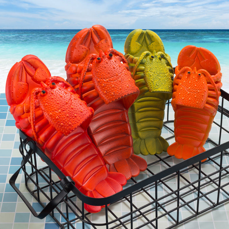 Colorful lobster-shaped shoes on a rack with a beach background