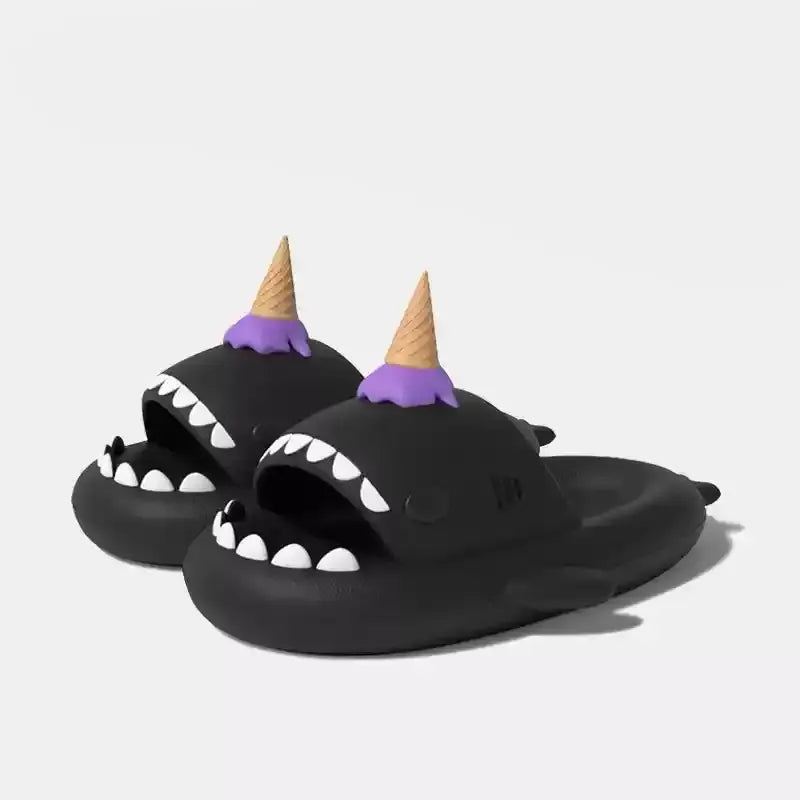 Black shark-shaped slippers with ice cream cone and purple accents on a white background
