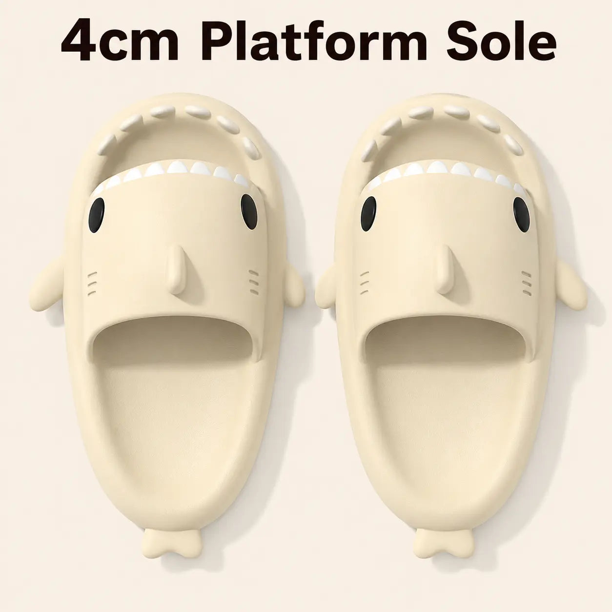 Pair of shark-shaped slippers with a 4cm platform sole on a light gray background.